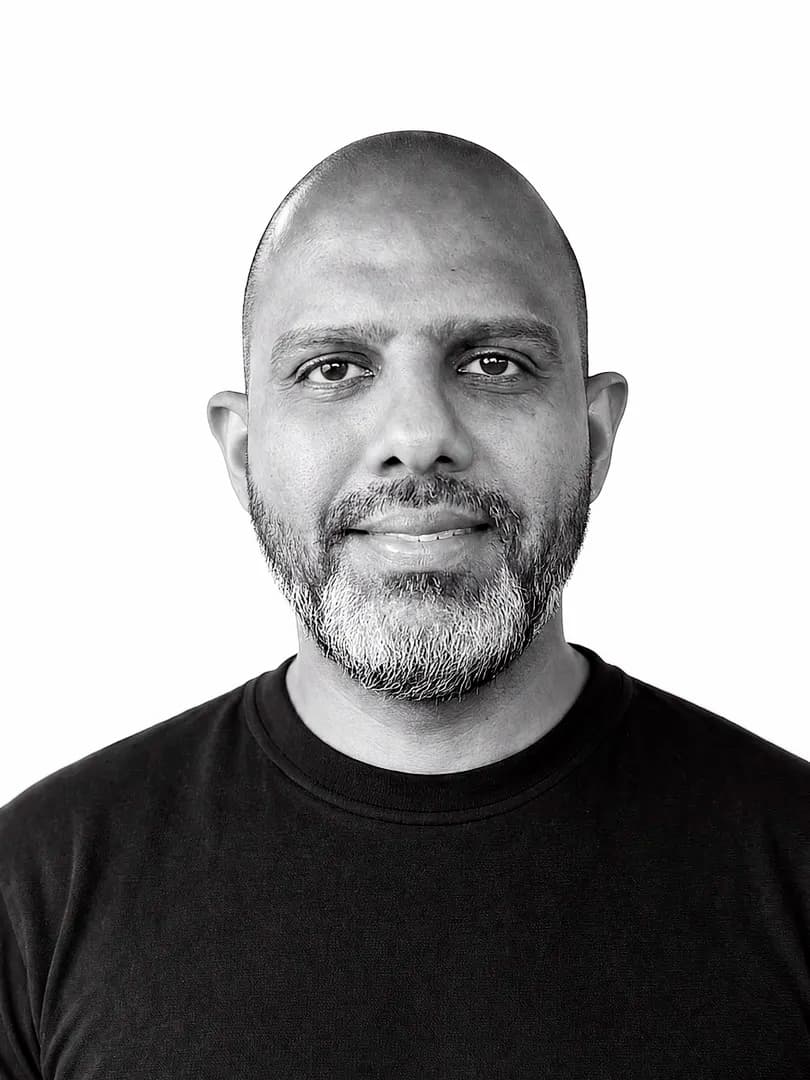 Indika Adikari, black-and-white studio portrait
